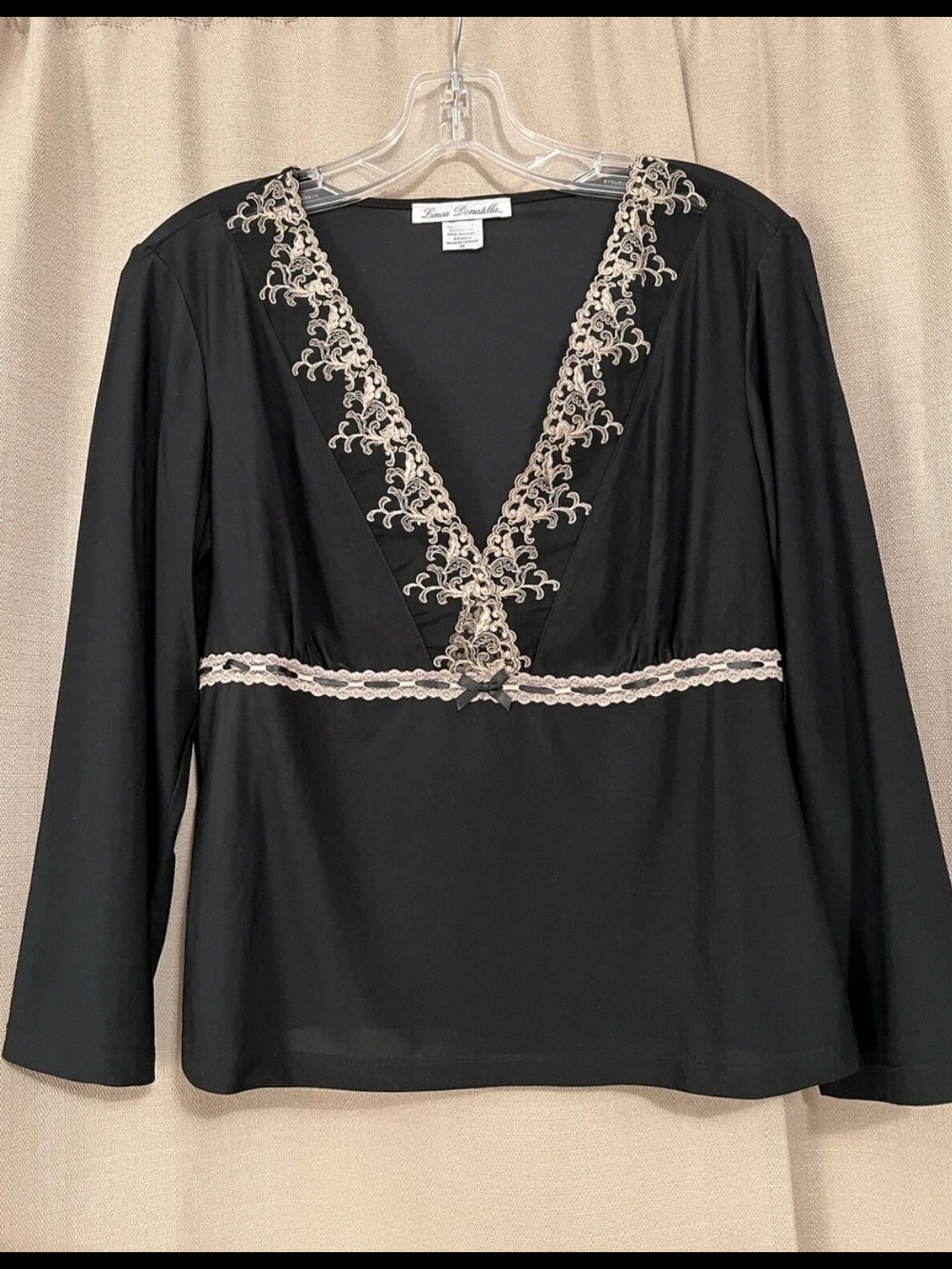 Elegant Black Long-Sleeve V-Neck Top with Cream Lace Trim